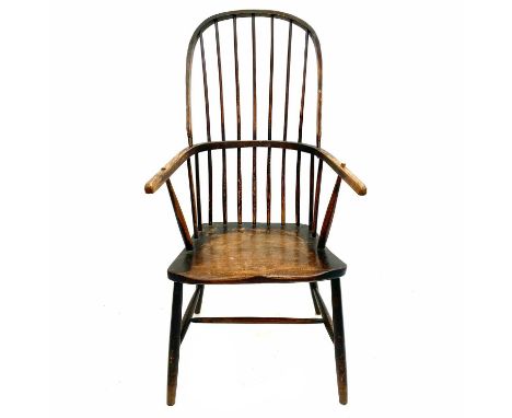 A Cornish fruitwood and ash Windsor armchair. 19th century, with plain hoop and stick back, on turned front legs, height 114c