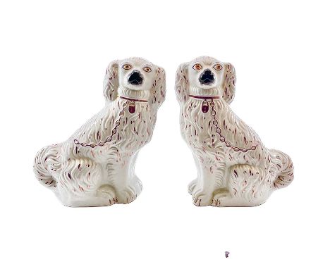 A pair of Victorian Staffordshire pink lustre spaniels. Height 27cm.No cracks, chips, or restoration. lustre decoration in go