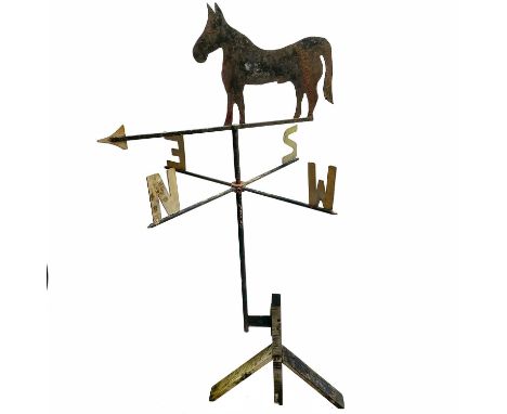 A wrought iron weather vane decorated with a horse. Height 118cm.