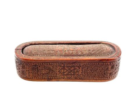 A late 18th century boxwood carved snuff box. With slide lid and endless knot design, length 11cm.The lid is a good fit, with