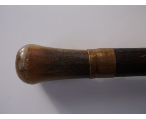 Antique Walking Stick with Rhino Horn Grip.
Late 19th/ early 20th century walking cane with rhinoceros horn handle and hardwo