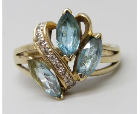 A 9ct gold three stone topaz ring, 3.2g, K