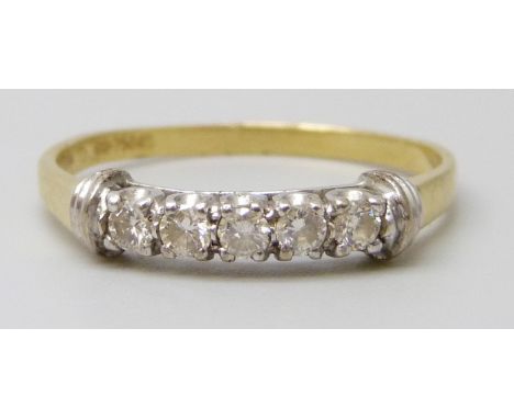 An 18ct gold five stone diamond ring, 2.6g, R