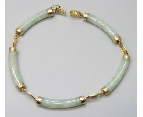 A Chinese 14ct gold and jade coloured stone bracelet, 10.5g, 19cm