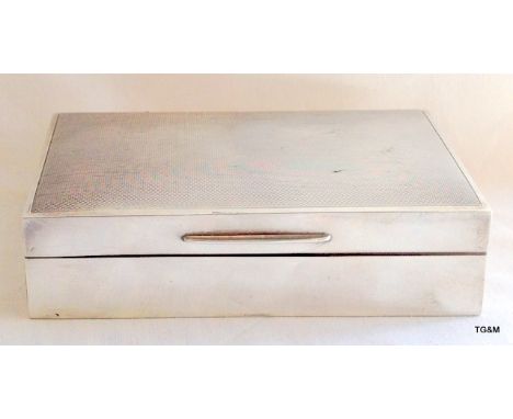 Silver table cigarette box with engine turned lid 13.5cm long