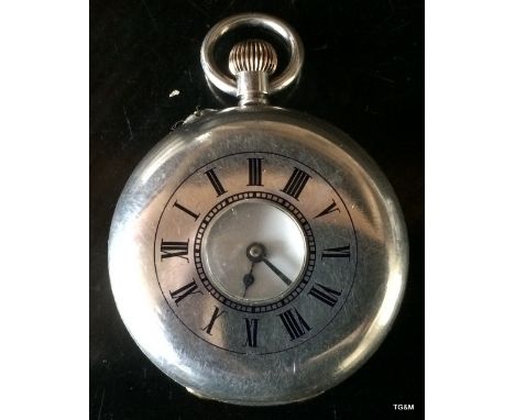 A silver hallmarked half hunter pocket watch