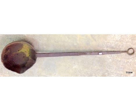 An antique cast iron steel works ladle 101cm long