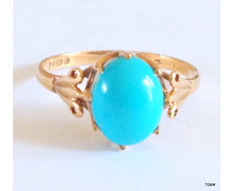 A 9ct gold hallmarked ladies turquoise ring size K