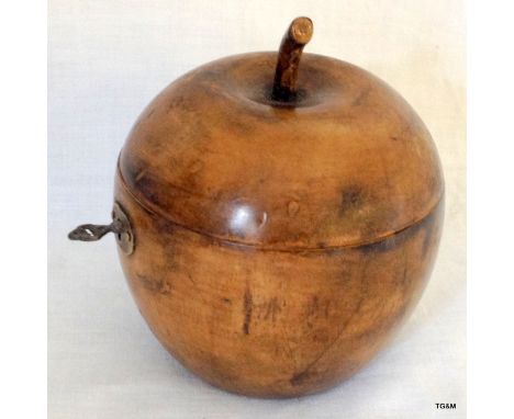 A fruit wood tea caddy in the form of an apple