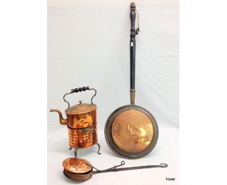 A Victorian copper kettle on stand, a copper nut warmer and a bed pan
