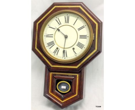 A mahogany cased 8 day wall clock