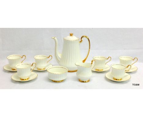 A Lubern bone china 6 piece coffee set with 22ct gold gilding