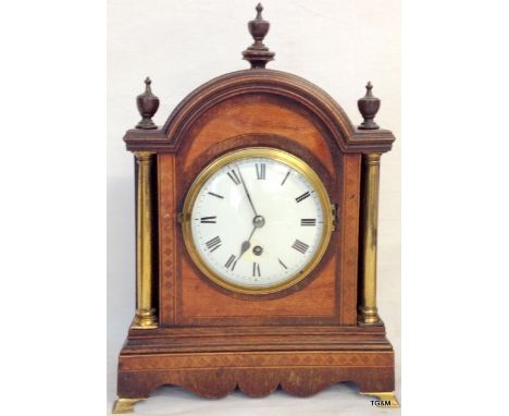 A mahogany mantle clock