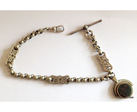 A silver pocket watch chain