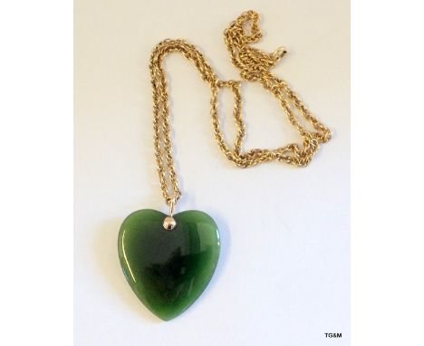 A Jade and gold heart necklace