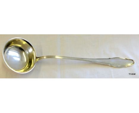 A Dutch solid silver ladle 35cm long