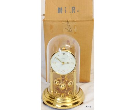 A glass domed Anniversary clock