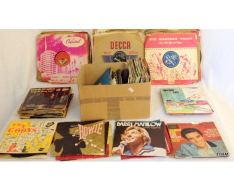 A collection of 78 and 45 records, to include Elvis Presley, The Beatles and other stars of the 60's & 70's