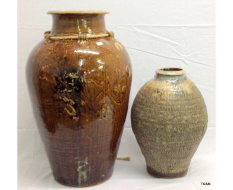 A Welsh Snowdonian rock vase and a large ceramic olive vase. 42cm tall and 62cm tall