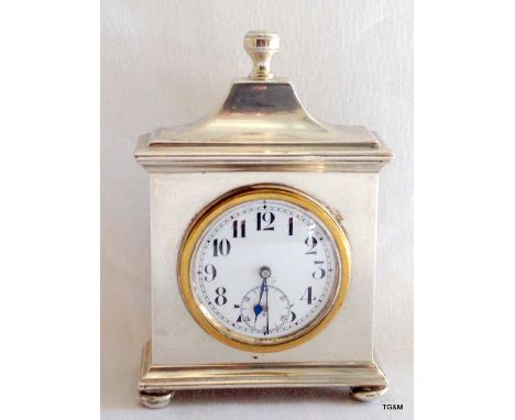 Ornate shaped silver desk clock