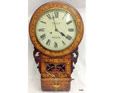 An American mahogany wall clock with inlaid case, dial signed Cole-Poole with Key 72cm long dial 41cm in diameter
