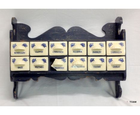 A painted pine and ceramic wall mounted spice rack 37h x 49w