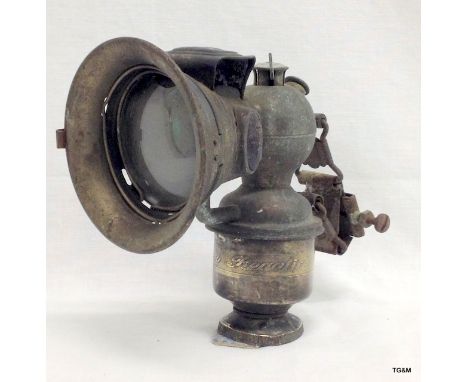 An Edwardian brass cycle lamp