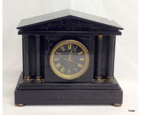 A 19th century black slate mantle clock 