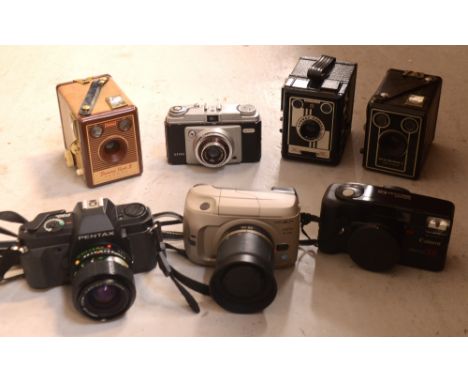 Six cameras to include a cased Six-20 Brownie D, a cased Conway camera, a Minolta Vectis S-100, a Pentax, a Konica Color S-SR