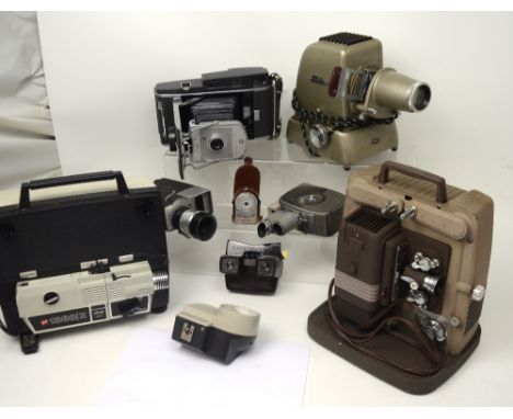 Vintage photography equipment and accessories to include a cased Polaroid Land Camera model 150, a cased Mansfield Holiday Re