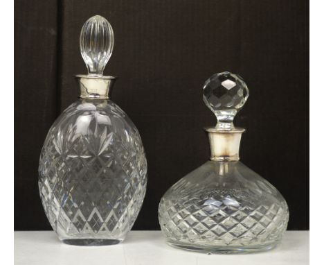 A clear glass decanter with Elizabeth II hallmarked silver collar, inscribed 'E II R 2nd June 1953' beneath crown, Birmingham