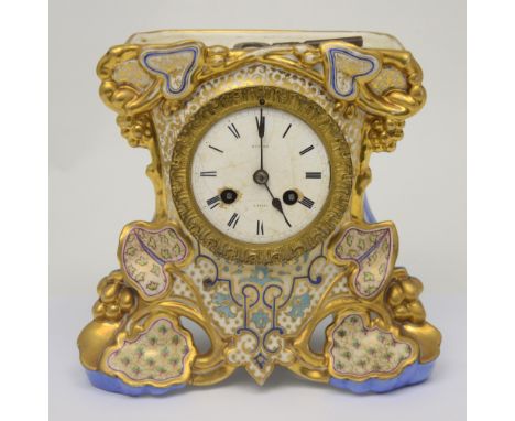 A late 19th century French porcelain mantel clock, height 20cm (dial af, lacking top half).
