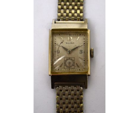 A c1940s gentlemen's Bulova tank-style wristwatch, white gold filled case with matching white gold filled mesh bracelet, high