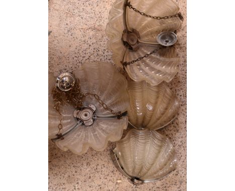 Two 1920s shell wall light fittings and two matching ceiling lights (4).
