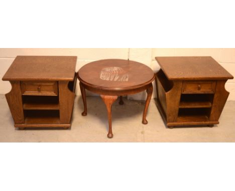 A pair of early 20th century oak magazine racks with central drawer and shelf, width 51.5cm and a mahogany circular side tabl