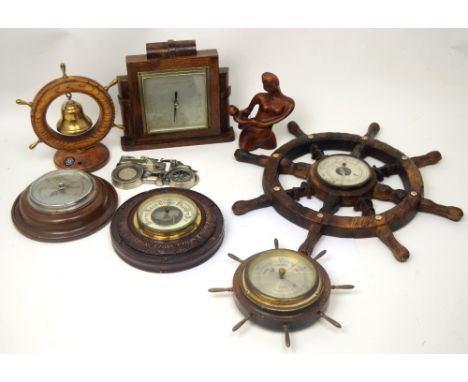 An early 20th century mahogany-framed aneroid barometer with further barometers by Smiths and Chadburns, together with other 
