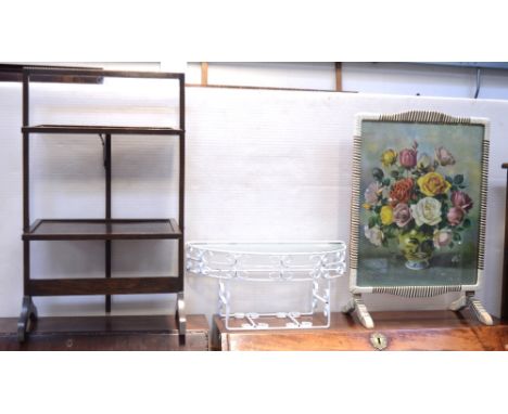 An Edwardian rectangular cake stand, a retro white metal half-shelf with glass top and a floral fire screen (3).