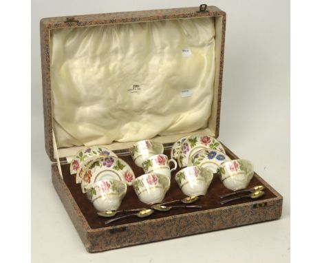 A case Royal Worcester 'Virginia' pattern coffee service comprising six cups and saucers and  six Walker & Hall silver-plated