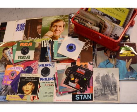 A programme signed by the Spinners and Cliff Hall, a quantity of singles to include Jim Reeves, Russ Conway, Tom Jones, Joe L