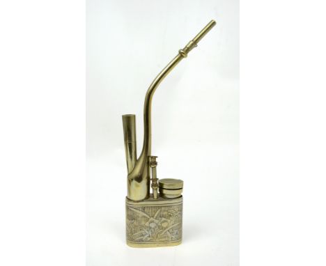 A reproduction opium pipe.