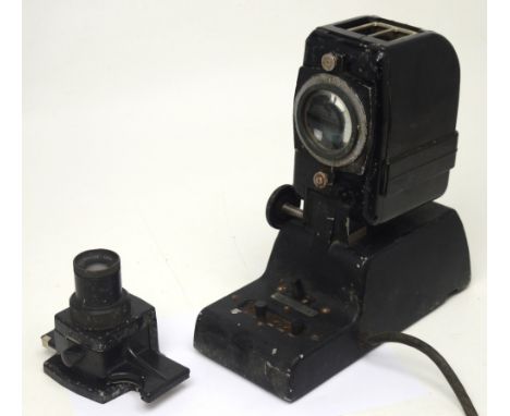 A cased WWII film strip projector manufactured by 'B.A.F Ltd', dated 1946, cat no.J.D.8670.