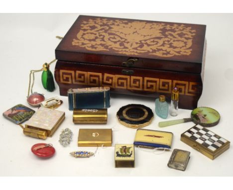 An Italian jewellery box containing vintage compacts to include a blue enamelled camera compact, a 'Clover' compact with ches