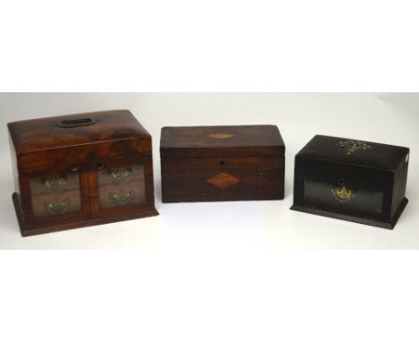 An Edwardian rosewood fitted jewellery cabinet, two glazed doors open to reveal two jewellery drawers below hinged lid, toget