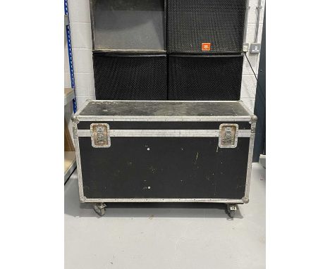 Three large aluminium flight cases. Heavy-duty and on wheels, the cases contain foam compartments and an abundance of cables,