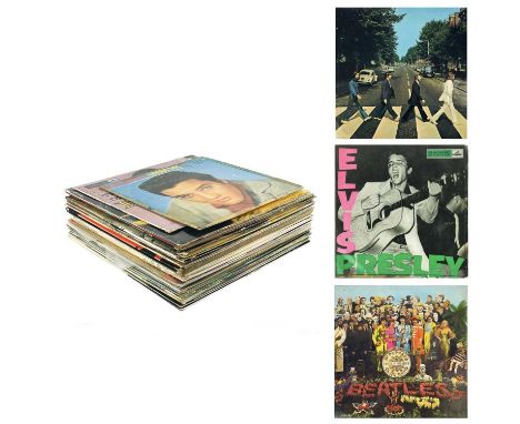 An excellent collection of 12" vinyl albums. Approximately thirty vinyl albums, containing a number of 1st pressings, rare an