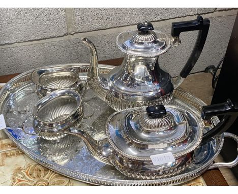 A good quality silver plated four piece tea service with a galleried tray. shipping unavailable 