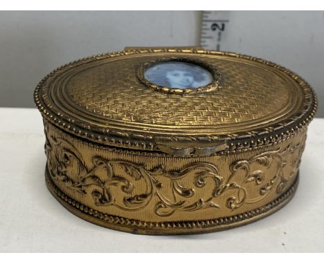 A antique gold toned trinket box 