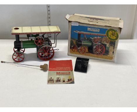 A vintage boxed Mamod steam tractor 