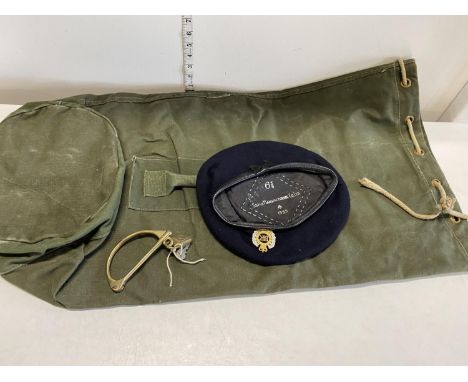 A late WW2/early 1950's army issue holdall with D ring and padlock and a Royal Engineers Supak manufacturing 1953 beret 