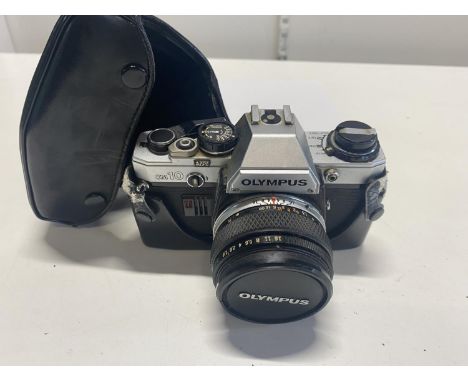 A Olympus OM-10 35mm camera (untested) 